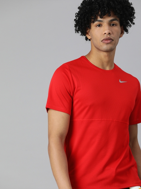 

Nike Men Red Solid Round Neck T-shirt