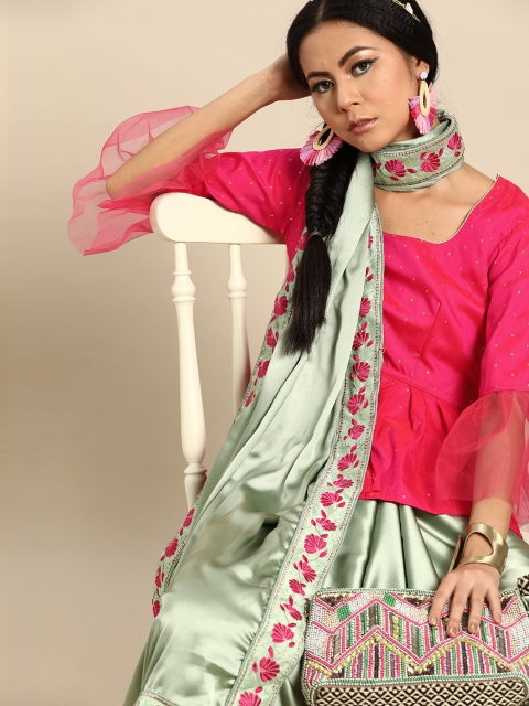 

Tikhi Imli Grey with a tinge of Green & Pink Embroidered Saree