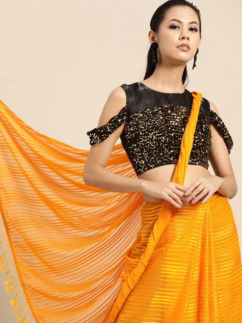 

Tikhi Imli Mustard Yellow Self-Striped Saree