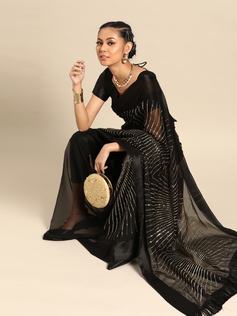 

Tikhi Imli Black & Golden Art Silk Embellished Saree
