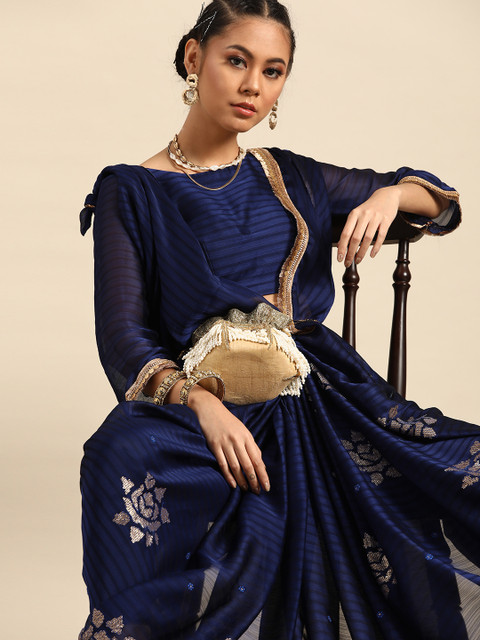 

Tikhi Imli Navy Blue & Golden Self-Striped Embellished Saree