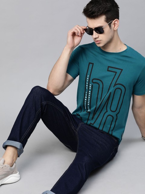 

Roadster Men Teal Blue & Black Cotton Typography Printed Round Neck T-shirt