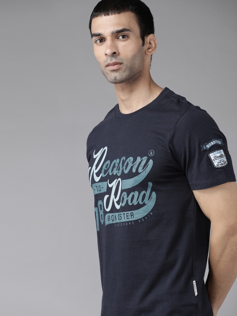 

Roadster Men Navy Blue & Teal Green Pure Cotton Typography Printed T-shirt