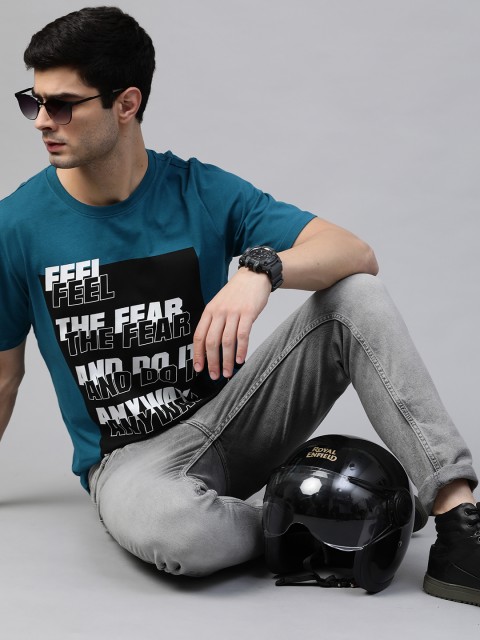 

Roadster Men Blue & Black Pure Cotton Typography Printed T-shirt
