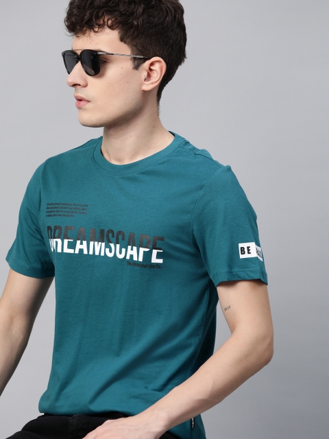 

Roadster Men Teal Blue & White Typography Printed Pure Cotton T-shirt