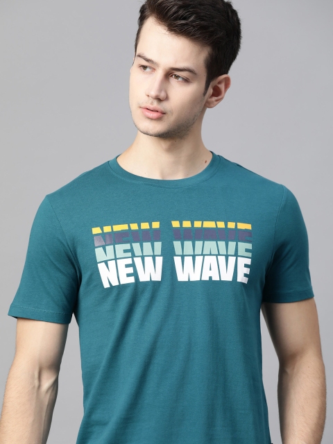 

Roadster Men Teal Blue & White Typography Printed Pure Cotton T-shirt