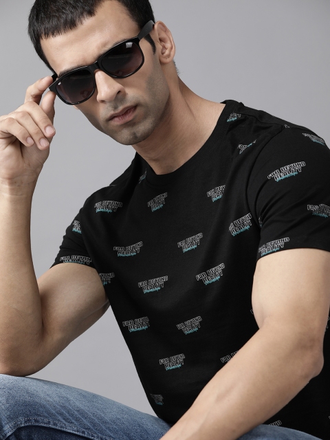 

Roadster Men Black White Typography Printed Pure Cotton T-shirt