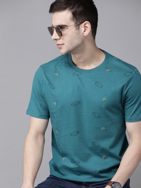 

Roadster Men Teal Blue & Black Printed Pure Cotton T-shirt