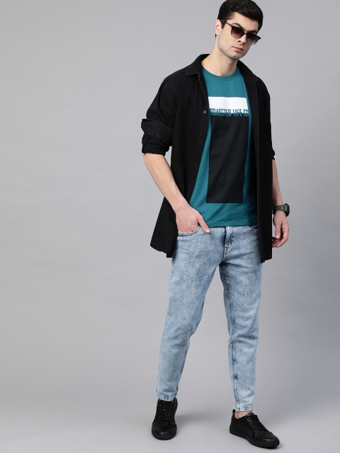 

Roadster Men Teal Blue & Black Geometric Print Pure Cotton T-shirt