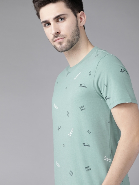 

Roadster Men Sea Green & Black Brand Logo Print Cotton T-shirt