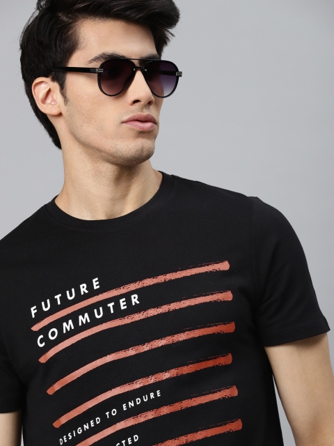 

Roadster Men Black & Maroon Typography Printed Pure Cotton Printed T-shirt