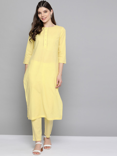 

HERE&NOW Women Yellow Solid Kurta with Trousers