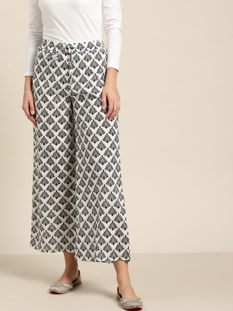 

Moda Rapido Women Off-White & Navy Blue Printed Wide Leg Palazzos