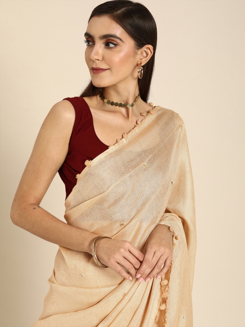 

Anouk Cream-Coloured Jute Silk Mirror Work Embroidered Saree with Pompoms