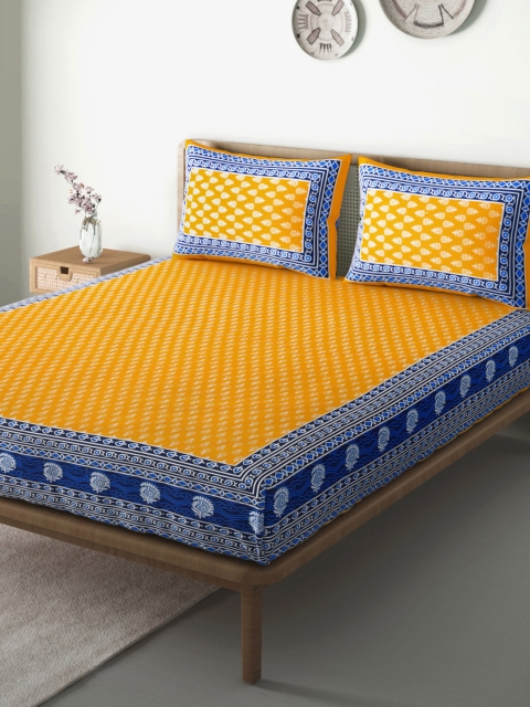 

Aura Yellow & Blue Ethnic Motifs 104 TC 110 GSM Cotton Queen Bedsheet with 2 Pillow Covers