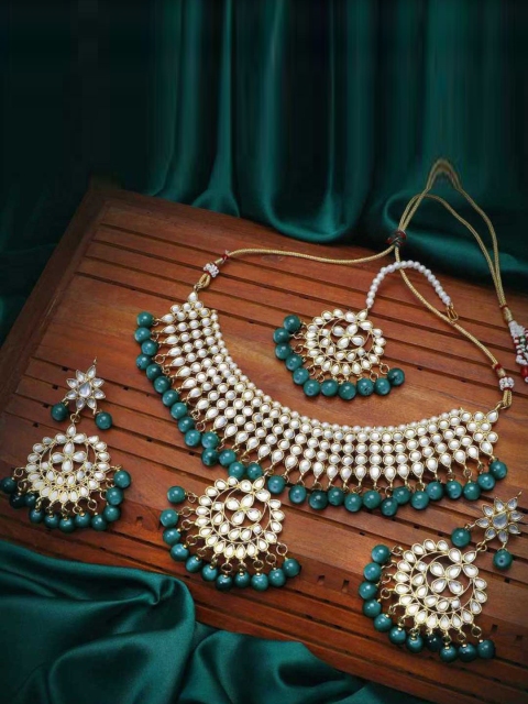 

Peora Gold Plated Teal Green Kundan Studded Jewellery Set