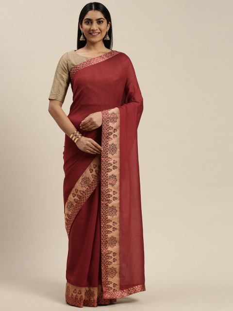 

Indian Women Maroon & Golden Silk Blend Solid Saree