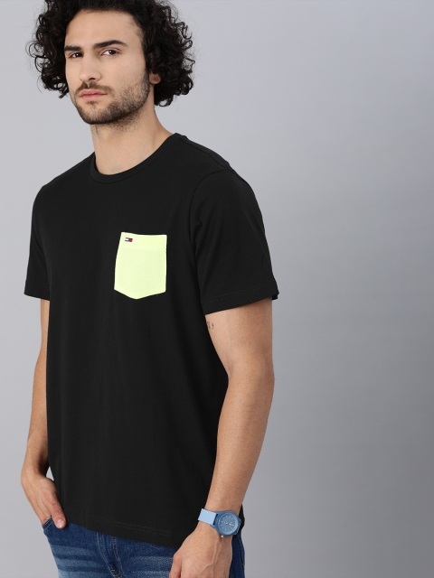 

Tommy Hilfiger Men Black Solid Round Neck T-shirt with Pockets