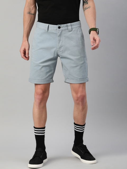 

Tommy Hilfiger Men Blue Solid Scanton Slim Fit Chino Shorts