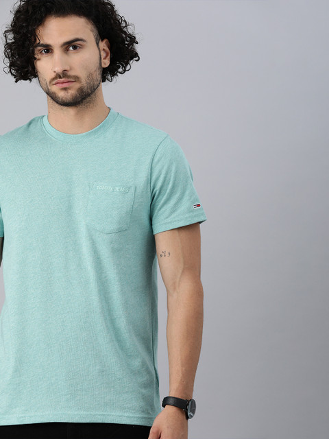 

Tommy Hilfiger Men Blue Solid Round Neck T-shirt with Pockets