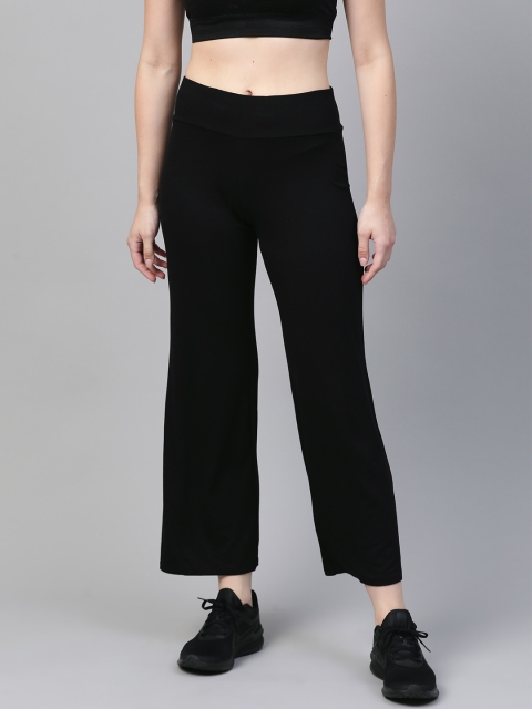 

Marks & Spencer Women Black Solid Track Pants