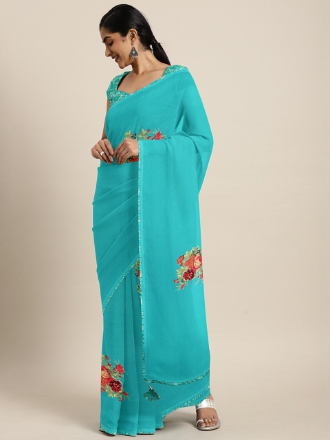 

Triveni Turquoise Blue & Red Pure Georgette Printed Saree