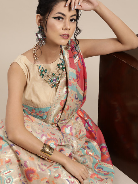 

Inddus Beige & Orange Woven Design Zari Chanderi Saree