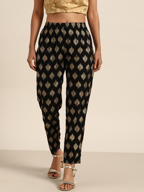 

Shae by SASSAFRAS Women Black & Golden Ethnic Foil Print Cropped Pencil Trousers