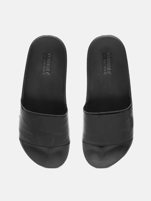 

Tommy Hilfiger Women Black Solid Sliders