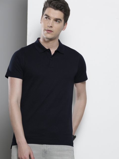 

Tommy Hilfiger Men Navy Blue Solid Polo Collar T-shirt