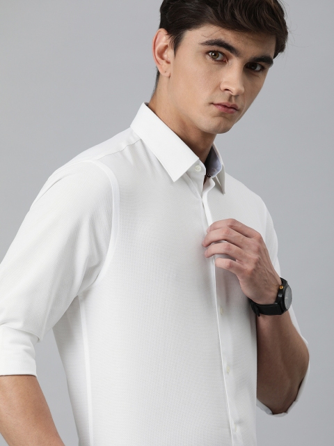 

Tommy Hilfiger Men White Slim Fit Self Design Easy Care Smart Casual Shirt