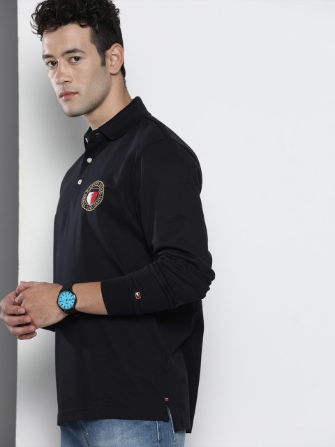

Tommy Hilfiger Men Navy Blue Solid Polo Collar Pure Cotton T-shirt with Applique