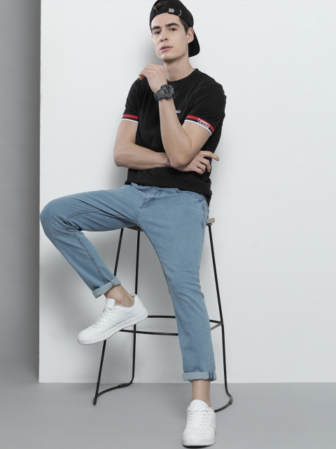 

Tommy Hilfiger Men Black Solid Round Neck Pure Cotton T-shirt