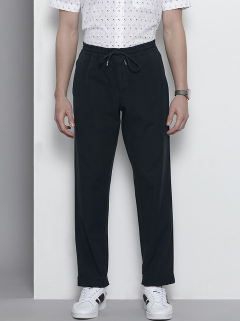 

Tommy Hilfiger Men Navy Blue Slim Fit Solid ACTIVE STRUCTURE Regular Trousers