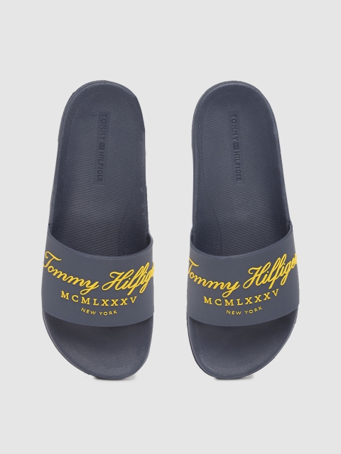 

Tommy Hilfiger Men Navy & Mustard Yellow Brand Logo Rubber Print Sliders, Navy blue