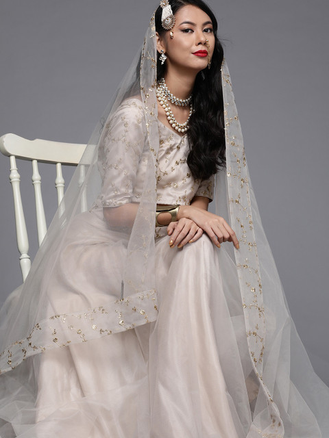 

Inddus Cream-Coloured & Golden Embroidered Semi-Stitched Lehenga Choli