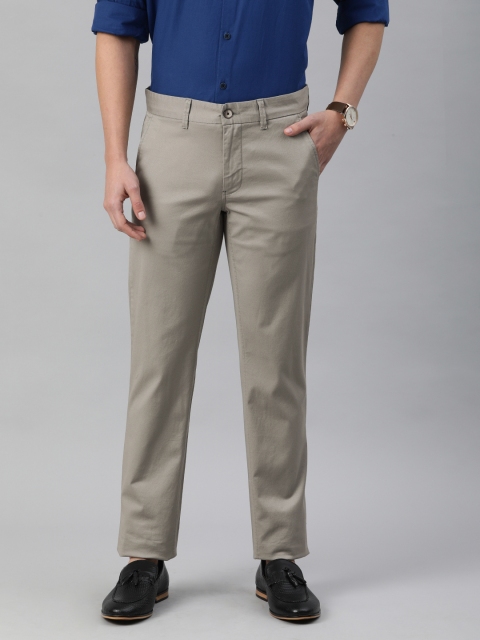 

Louis Philippe Sport Men Beige Textured Tapered Fit Low-Rise Regular Trousers