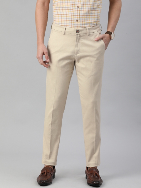 

Louis Philippe Sport Men Beige Textured Tapered Fit Low-Rise Pleated Regular Trousers