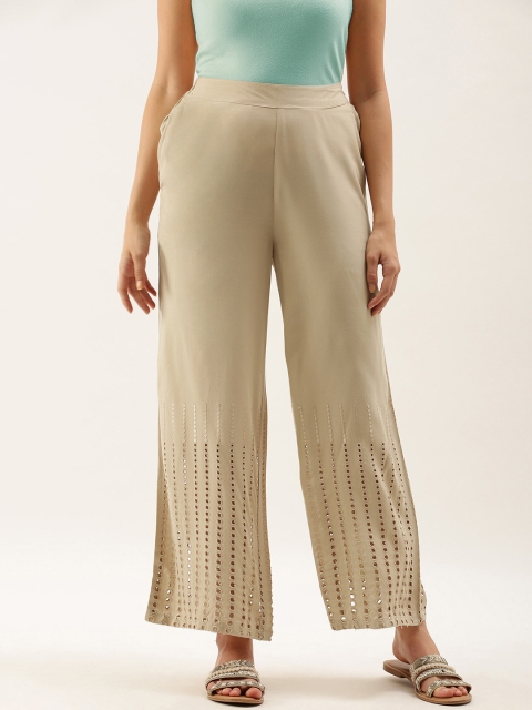 

Anouk Women Beige Solid Flared Palazzos
