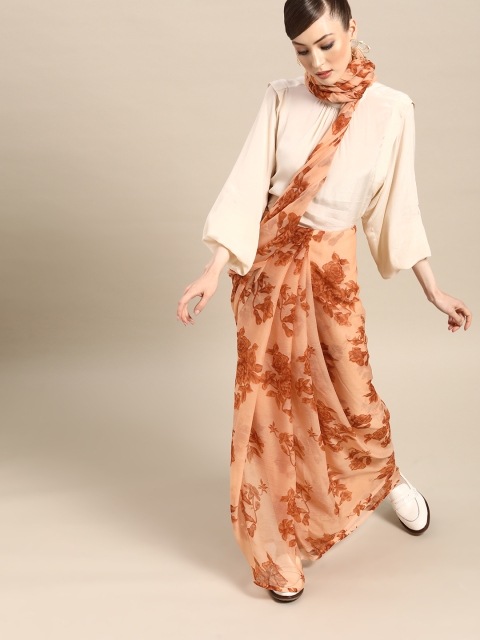 

Tikhi Imli Calm Peach and Brown Printed Poly Chiffon Saree