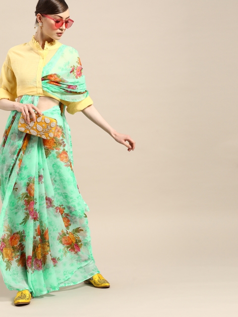 

Tikhi Imli Jazzy Green and Orange Printed Poly Chiffon Saree