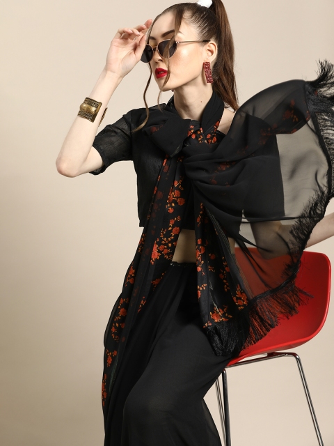 

Tikhi Imli Deep Black and Orange Sleek Poly Georgette Saree