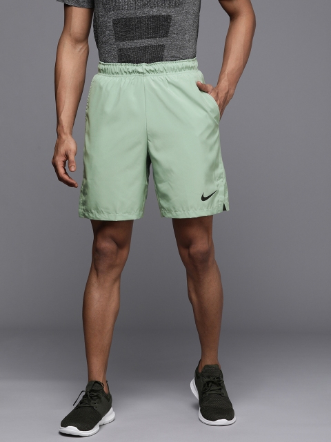 

Nike Men Green Solid Regular Fit Sports Shorts