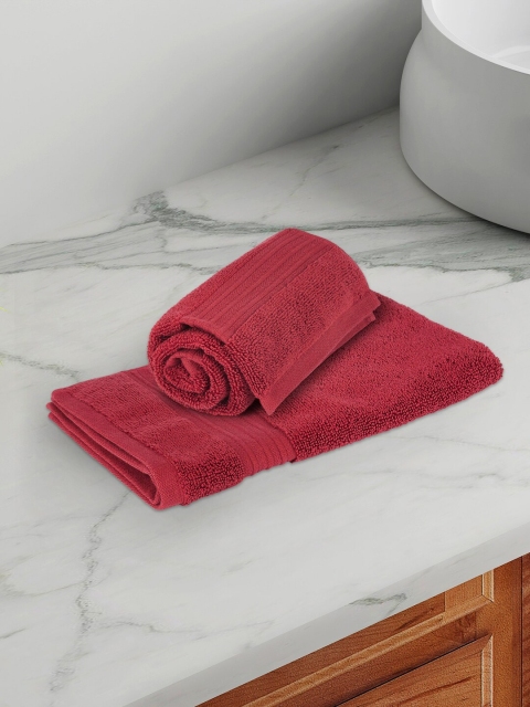 

Living scapes by Pantaloons Maroon Solid 550 GSM Cotton Hand Towel