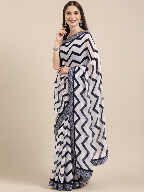 

Mitera White & Navy Blue Poly Georgette Printed Saree