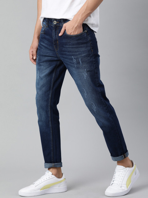 

Mast & Harbour Men Blue Mildly Distressed Heavy Fade Slim Tapered Fit Stretchable Jeans