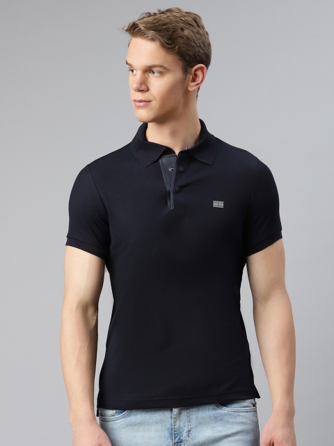 

Tommy Hilfiger Men Navy Blue Solid Slim Fit Polo Collar T-shirt