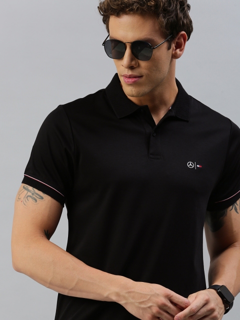 

Tommy Hilfiger Men Black Solid Polo Collar T-shirt