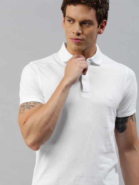 

Tommy Hilfiger Men White Solid Polo Collar T-shirt