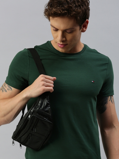

Tommy Hilfiger Men Green Solid Round Neck T-shirt